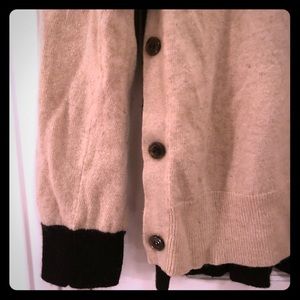 Cream part cashmere sweater with buttons on sides
